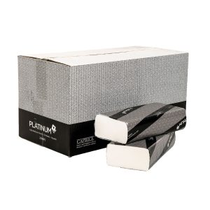 A carton of 2400PL Platinum Interleaved Towels sits with two sleeves of the interleaved towels.
